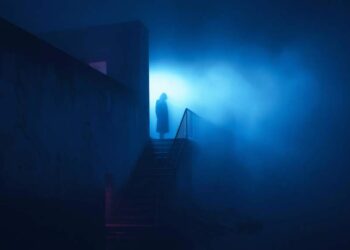 A cinematic liminal apartment hallway after midnight with a mysterious door and warm light underneath, created for The Room After Thinking from The Quiet Archive by Wartonno Sound.